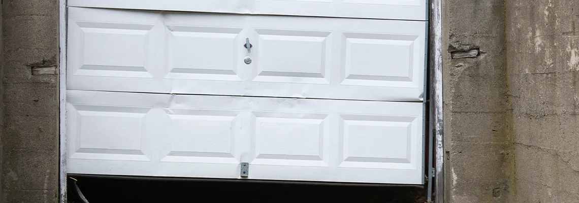 Garage Door Got Hit By A Car Dent Removal in Highland Park, IL